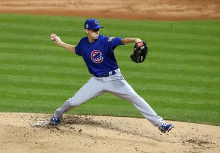 Nov 2, 2016; Cleveland, OH, USA; Chicago Cubs starting pitcher Kyle Hendricks throws a pitch against the Cleveland Indians in the first inning in game seven of the 2016 World Series at Progressive Field. Mandatory Credit: Charles LeClaire-USA TODAY Sports - RTX2RMDU