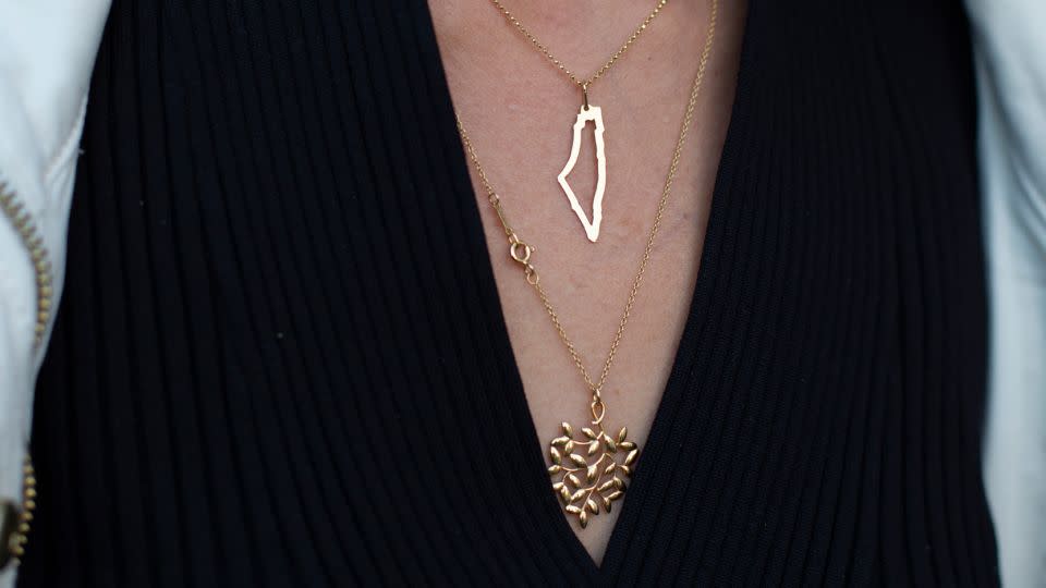 Qasim shows her love for her ancestral homeland with her accessories. - Laura Oliverio/CNN