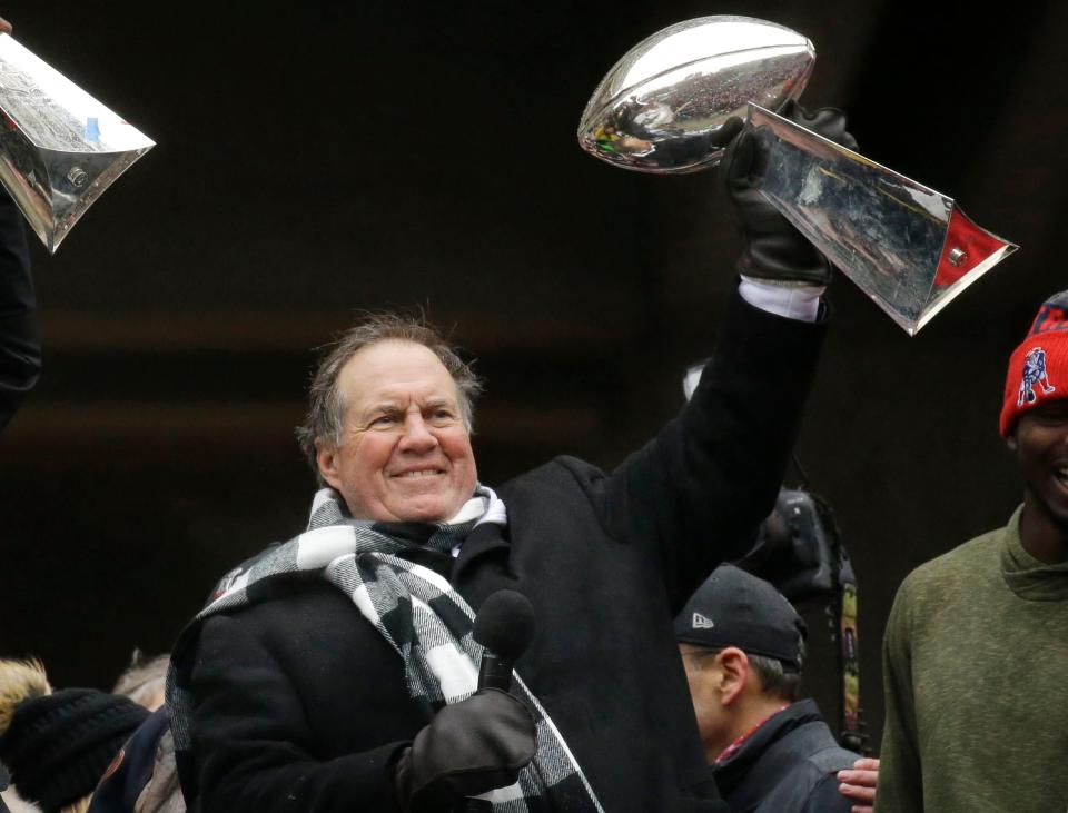 FILE - New England Patriots coach Bill Belichick holds up a Super Bowl trophy as he addresses the crowd during a rally Feb. 7, 2017, in Boston to celebrate the team's win over the Atlanta Falcons in the NFL Super Bowl 51 football game in Houston. Six-time NFL champion Bill Belichick has agreed to part ways as the coach of the New England Patriots on Thursday, Jan. 11, 2024, bringing an end to his 24-year tenure as the architect of the most decorated dynasty of the league’s Super Bowl era, a source told the Associated Press on the condition of anonymity because it has not yet been announced. (AP Photo/Elise Amendola, File)