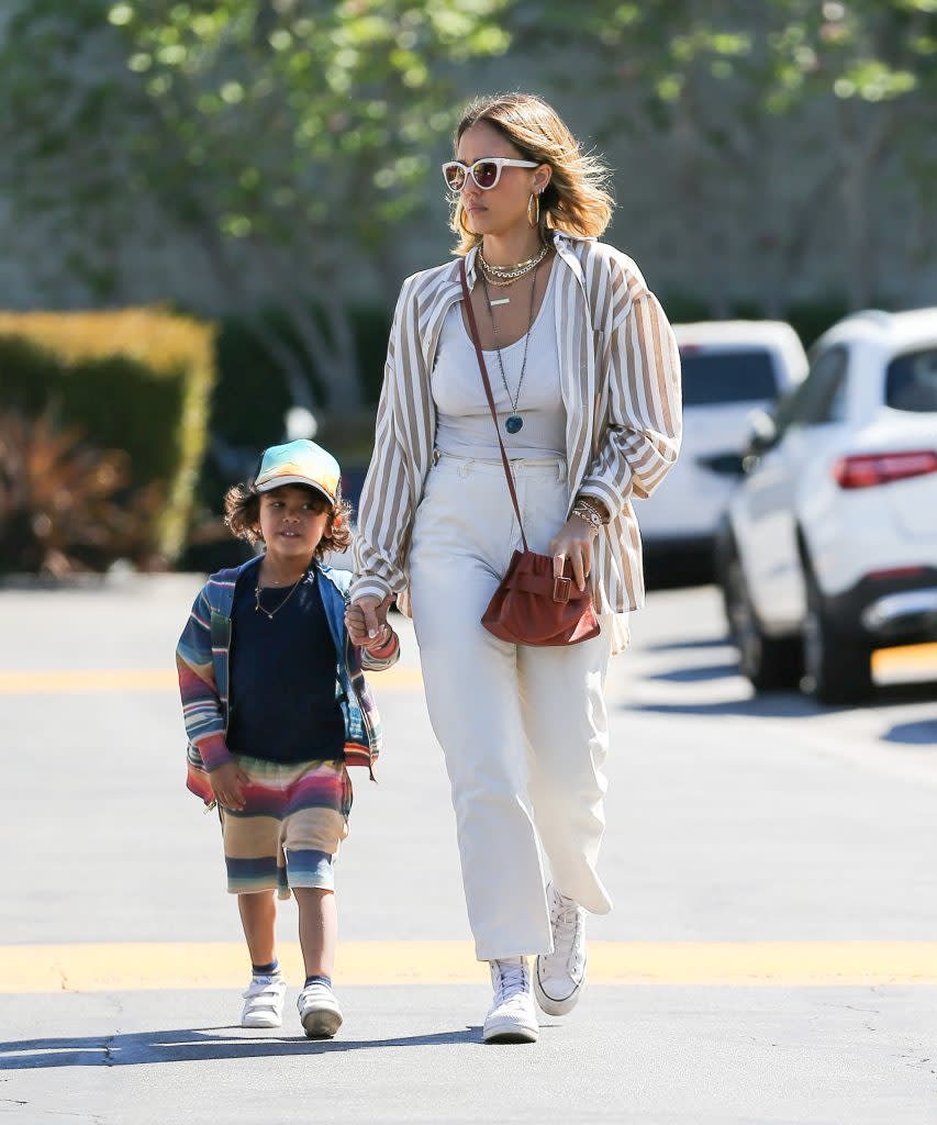 Jessica Alba and her son Hayes stroll in Los Angeles on March 12, 2022. - Credit: Bellocqimages/Bauergriffin.com / MEGA