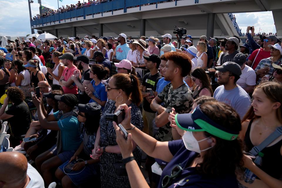 Tennis fans pack  Court 16 as Serena Williams practices before her match during the Western & Southern Open at the Lindner Family Tennis Center in Mason Tuesday, August 16, 2022.