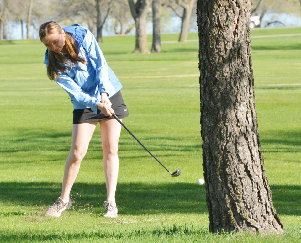 Mackenzie Everson of Castlewood punches through the trees on No. 1 Red during the Pre-Region 1B/Eastern Coteau Conference golf tournament at Cattail Crossing Golf Course.