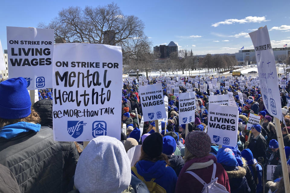 At least 2,000 striking Minneapolis teachers, support staff and their supporters rallied outside the State Capitol in St. Paul, Minn., on Wednesday, March 9, 2022. Minneapolis teachers walked out Tuesday to press their demands for better pay, smaller class sizes and more mental health supports for students. (AP Photo/Steve Karnowski)