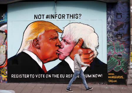 A mural of Donald Trump embracing Boris Johnson is seen on a building in Bristol, Britain May 24, 2016. REUTERS/Peter Nicholls