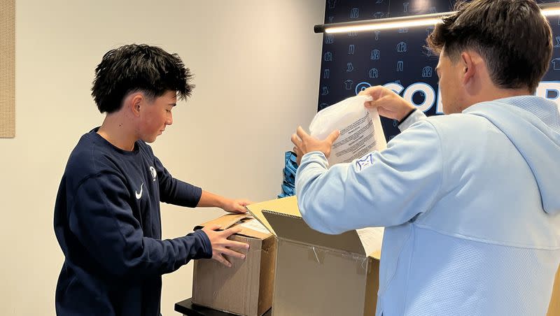 BYU golfer Keanu Akina, right, and his younger brother Kihei, a BYU commit from Lone Peak High, talk about their project with And&Collar to send 165 white dress shirts to Latter-day Saint youth on the island of Maui to help families affected by the 2023 Lahaina wildfires.