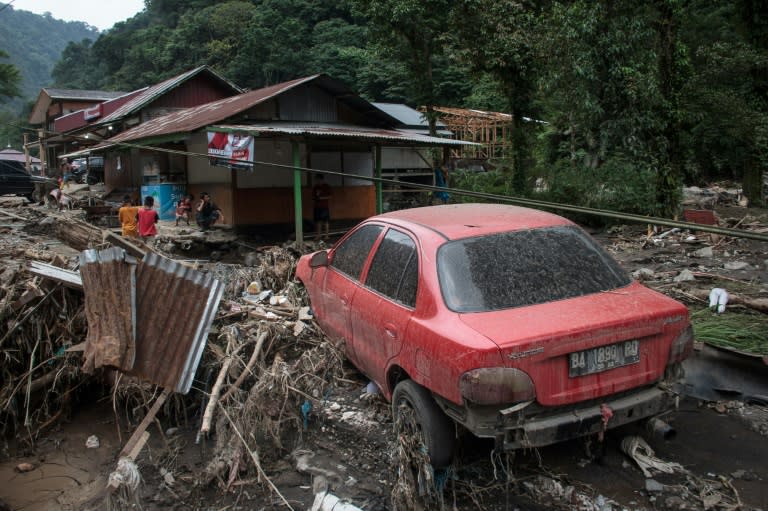 Flash floods and cold lava flow from a volcano hit several districts in western Indonesia (REZAN SOLEH)
