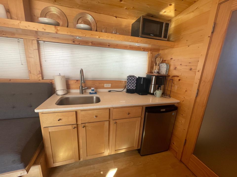 kitchen with sink, microwave, and mini fridge in tiny home airbnb near disneyland