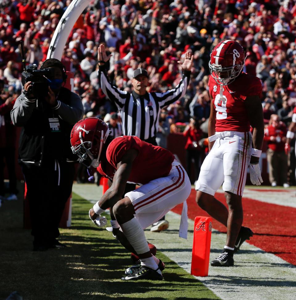Nov 13, 2021; Tuscaloosa, Alabama, USA;  Alabama wide receiver Jameson Williams (1) celebrates after scoring a touchdown against New Mexico State at Bryant-Denny Stadium. Mandatory Credit: Gary Cosby Jr.-USA TODAY Sports