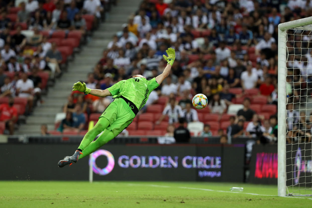 Juventus keeper Wojciech Szczesny beaten by Harry Kane's long-range strike. (Photo by Tottenham Hotspur FC/Tottenham Hotspur FC via Getty Images)