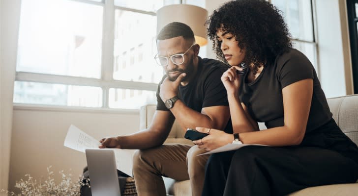 A couple trying to weight their options of a 401(k) loan and a HELOC