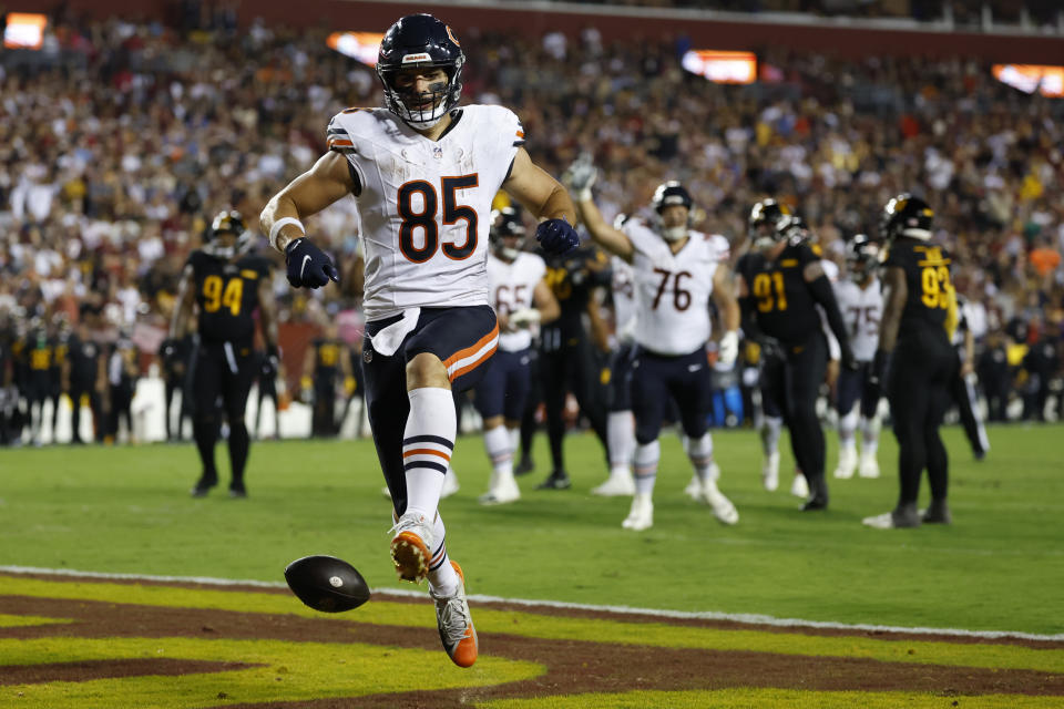 Chicago Bears tight end Cole Kmet (85) celebrates after catching a touchdown pass against the Washington Commanders. Mandatory Credit: Geoff Burke-USA TODAY Sports