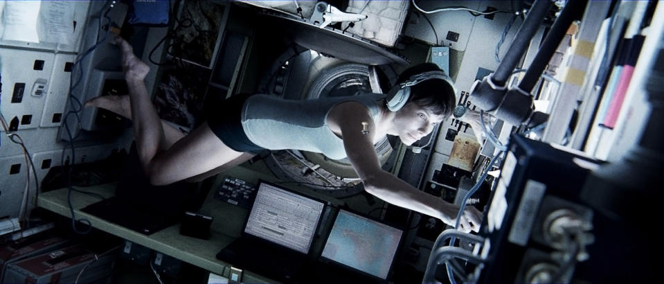 This publicity photo released by courtesy of Warner Bros. Pictures shows Sandra Bullock, as Dr. Ryan Stone, in Warner Bros. Pictures’ sci-fi thriller “Gravity,” a Warner Bros. Pictures release. (AP Photo/Courtesy Warner Bros. Pictures)