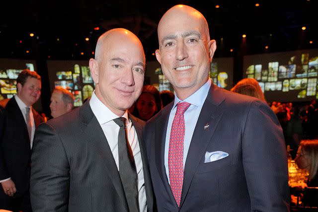 <p>Kevin Mazur/Getty</p> Jeff Bezos and Mark Bezos attend the Robin Hood Benefit 2022 on May 09, 2022 in New York City.