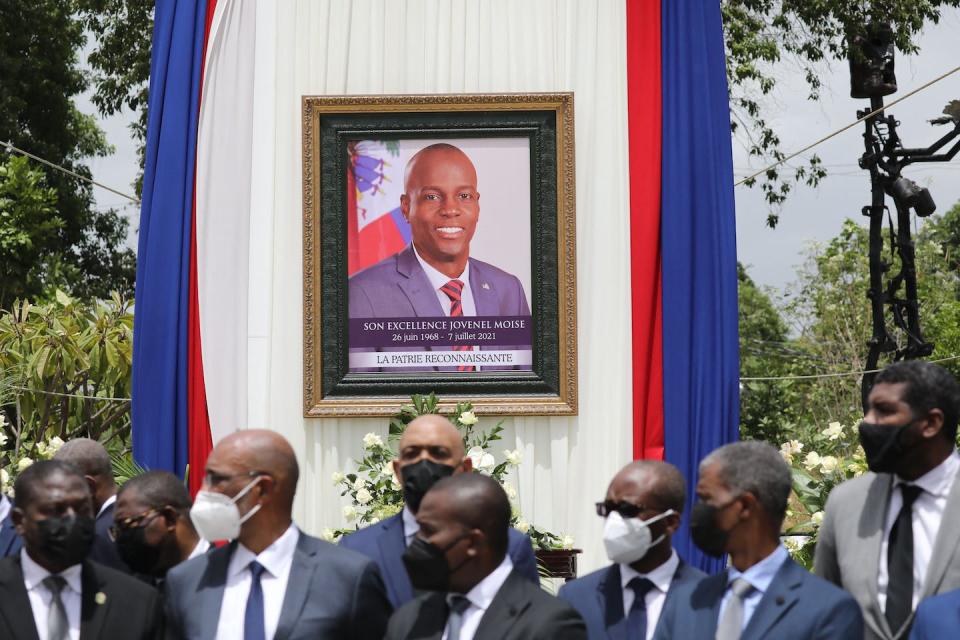 Officials attend a ceremony in honor of slain Haitian leader Jovenel Moïse in July 2021. <a href="https://www.gettyimages.com/detail/news-photo/officials-attend-a-ceremony-in-honor-of-late-haitian-news-photo/1234075334?adppopup=true" rel="nofollow noopener" target="_blank" data-ylk="slk:Valerie Baeriswyl/AFP via Getty Images;elm:context_link;itc:0;sec:content-canvas" class="link ">Valerie Baeriswyl/AFP via Getty Images</a>