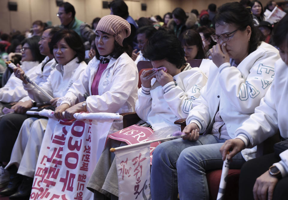 South Korean supporters react after the South Korean city of Busan failed to win the right to host the 2030 World Expo, in Busan, South Korea, Wednesday, Nov. 29, 2023. (Son Hyung-joo/Yonhap via AP)