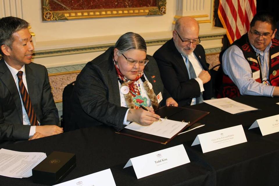 Corinne Sams, of the Confederated Tribes of the Umatilla Indian Reservation and chairperson of Columbia River Inter-Tribal Fish Commission, signs an agreement between the Biden administration and the CTUIR, Nez Perce Tribe, Confederated Tribes of the Warm Springs Reservation, Yakama Nation and states of Oregon and Washington. Confederated Tribes of the Umatilla Indian Reservation