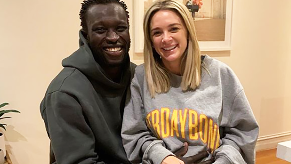Majak Daw and partner Emma McKay took to Instagram to announce their baby news. Picture: Instagram/emomckay