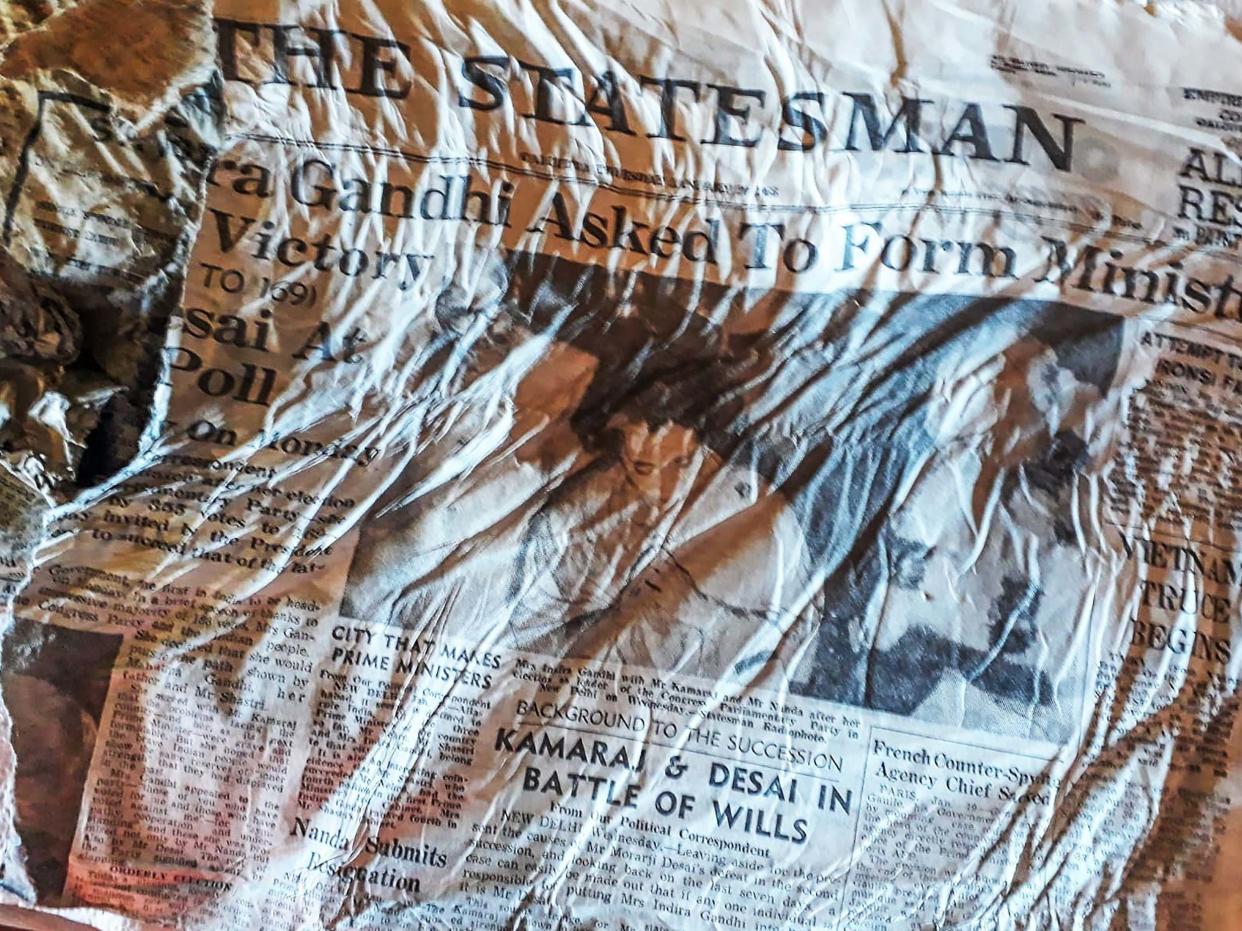 A 1966 copy of Indian newspaper The Statesman with a headline announcing the election of Indira Gandhi, likely to have been on board the Air India Boeing 707 that crashed in the nearby Mont Blanc massif in January 1966. The papers emerged as the Bossons glacier in the French Alps rapidly melts: BERNARD BARRON/AFP via Getty Images