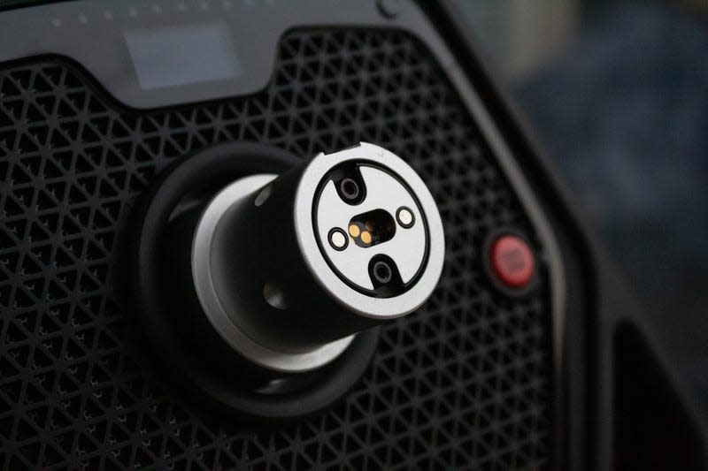 Close up on direct drive hub of Logitech G Pro steering wheel base.
