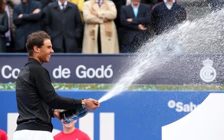 Tennis - Barcelona Open Final - Rafael Nadal of Spain v Dominic Thiem of Austria - Real Club de Tenis Barcelona, Spain - 30/04/17 - Rafael Nadal sprays cava. REUTERS/Albert Gea