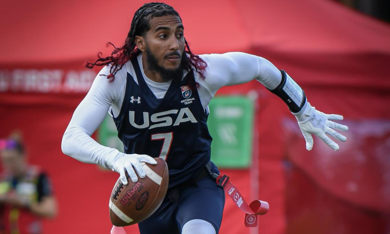 <span>Darrell ‘Housh’ Doucette threw six touchdown passes while he led the US to a fifth consecutive world flag football championship.</span><span>Photograph: International Federation of American Football</span>