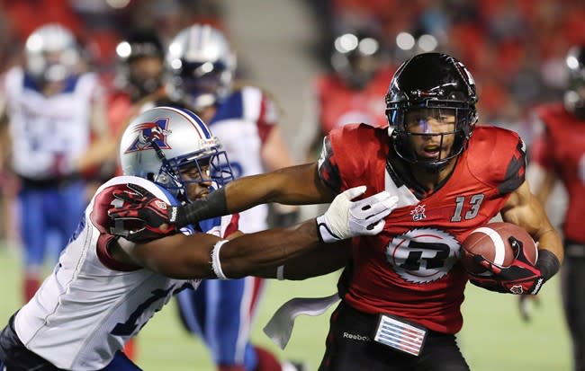 Billy Parker (17) and Montreal beat Khalil Paden (13) and Ottawa Friday. If the Alouettes lose both of their last games and the Redblacks win their last two, we could have a three-way tie in the East. (Fred Chartrand/The Canadian Press.)