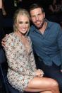 <p> Carrie Underwood was set up with her husband, Mike Fisher, through her band&apos;s bassist, Mark Childers. Underwood told VH1&apos;s&#xA0;<em>Behind the Music&#xA0;</em>that she was&#xA0;initially skeptical about a blind date. &quot;I mean, can I make dating more difficult? Let&apos;s get a hockey guy who lives in another country. Awesome.&quot; But after meeting backstage after one of her shows, the match was an apparent success. The couple went on their first date a few months later. They then got married had children. </p>