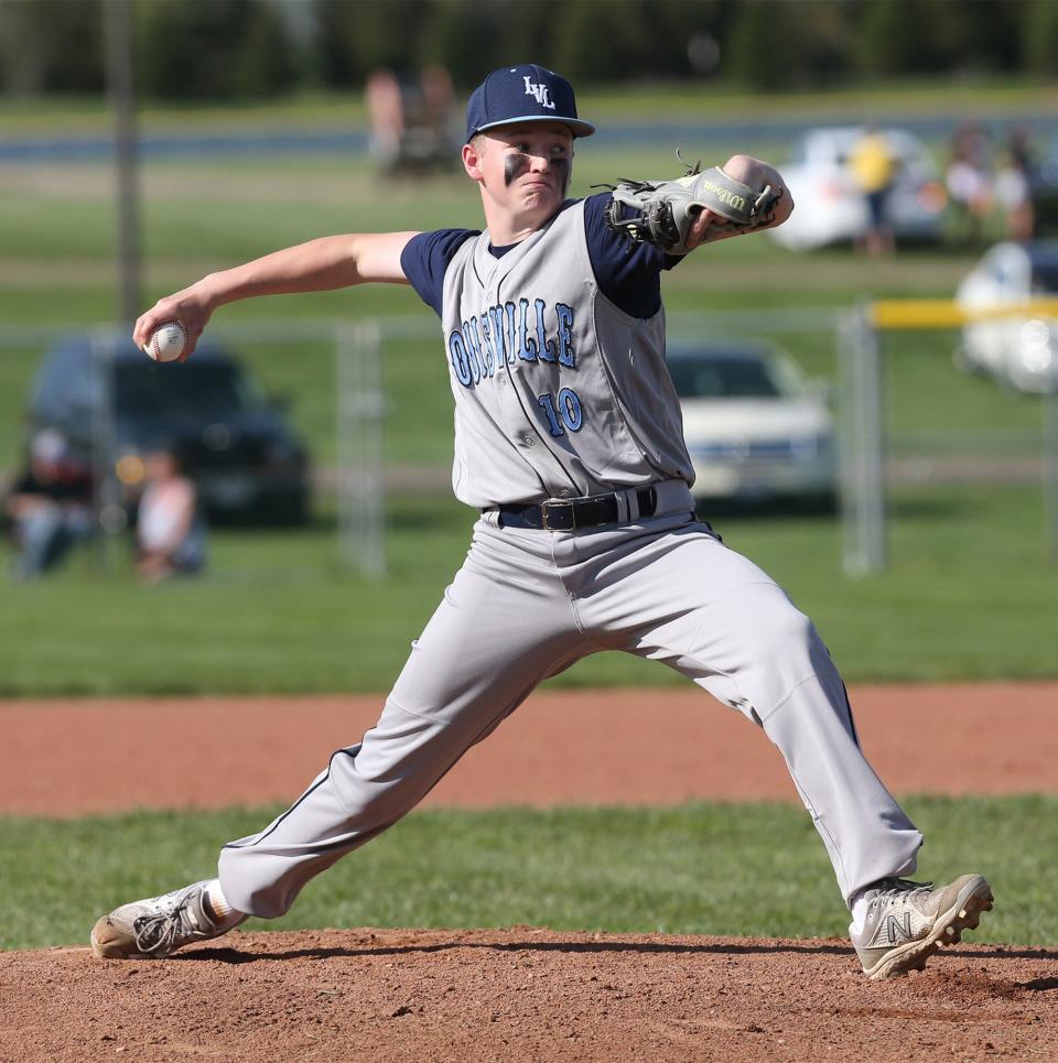 Zach Root of Louisville delivers a pitch during their game at Lake on Tuesday, May 10, 2022.