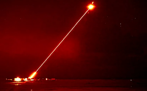 <span class="caption">Dragonfire laser system test firing.</span> <span class="attribution"><span class="source">UK Ministry of Defence/wikipedia</span>, <a class="link " href="http://creativecommons.org/licenses/by-sa/4.0/" rel="nofollow noopener" target="_blank" data-ylk="slk:CC BY-SA;elm:context_link;itc:0;sec:content-canvas">CC BY-SA</a></span>