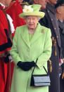 <p>The Queen wore a very similar number back in 2016 to welcome the President of Colombia. However, she dressed the green coat up for the occasion with a matching hat. [Photo: Getty] </p>