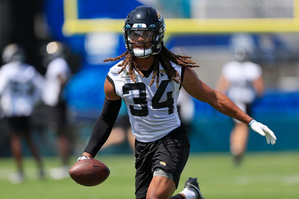Jacksonville Jaguars cornerback Gregory Junior (34) runs the ball during an organized team activity Tuesday, May 30, 2023 at TIAA Bank Field in Jacksonville, Fla. 