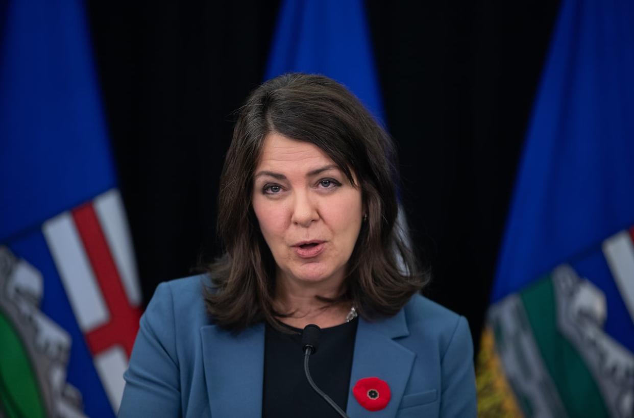 Premier Danielle Smith announces a restructuring of Alberta Health Services during a news conference in Edmonton on Nov. 8. This week, the new AHS board announced six senior executives are no longer in their roles. (Jason Franson/The Canadian Press - image credit)