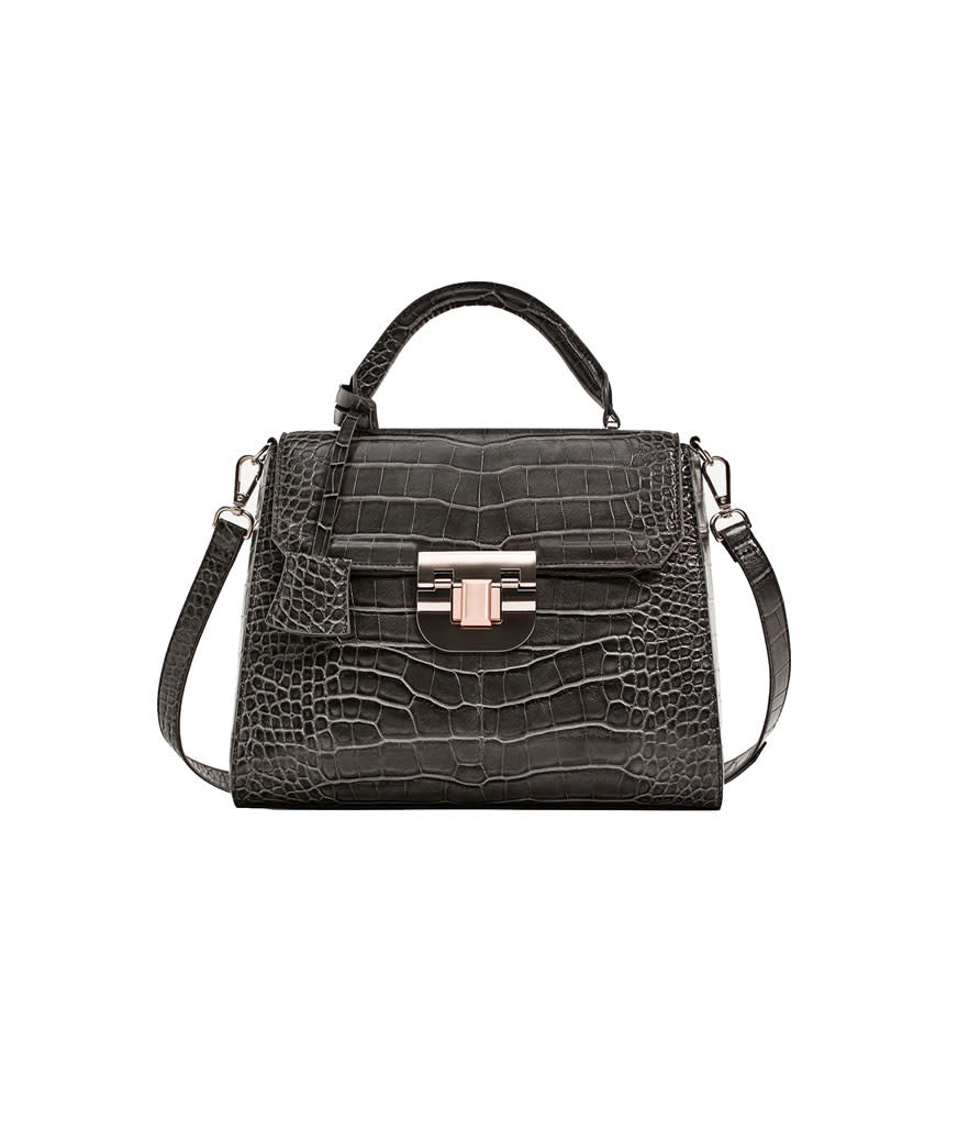 <p>Embossed City Bag With Fastening Detail, $56, <a rel="nofollow noopener" href="https://www.zara.com/us/en/collection-aw-17/woman/bags/embossed-city-bag-with-fastening-detail-c269200p4613049.html" target="_blank" data-ylk="slk:Zara.com;elm:context_link;itc:0;sec:content-canvas" class="link ">Zara.com</a> </p>