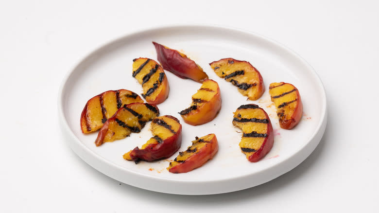 seared peaches on a plate