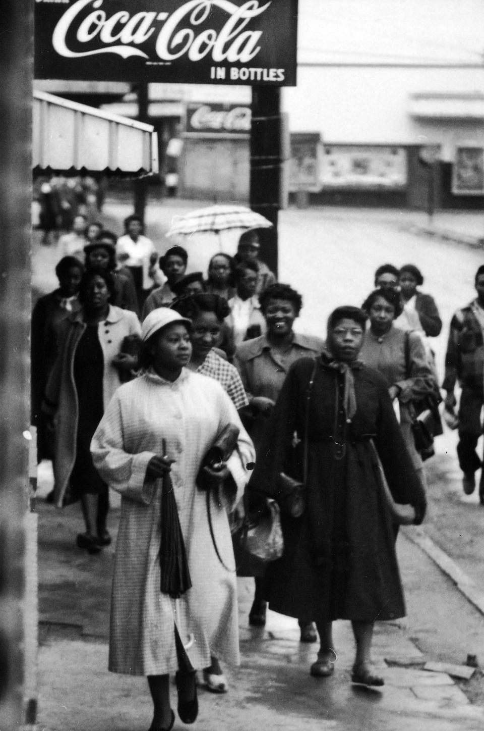 Woman walking to work during the Montgomery Bus Boycott.