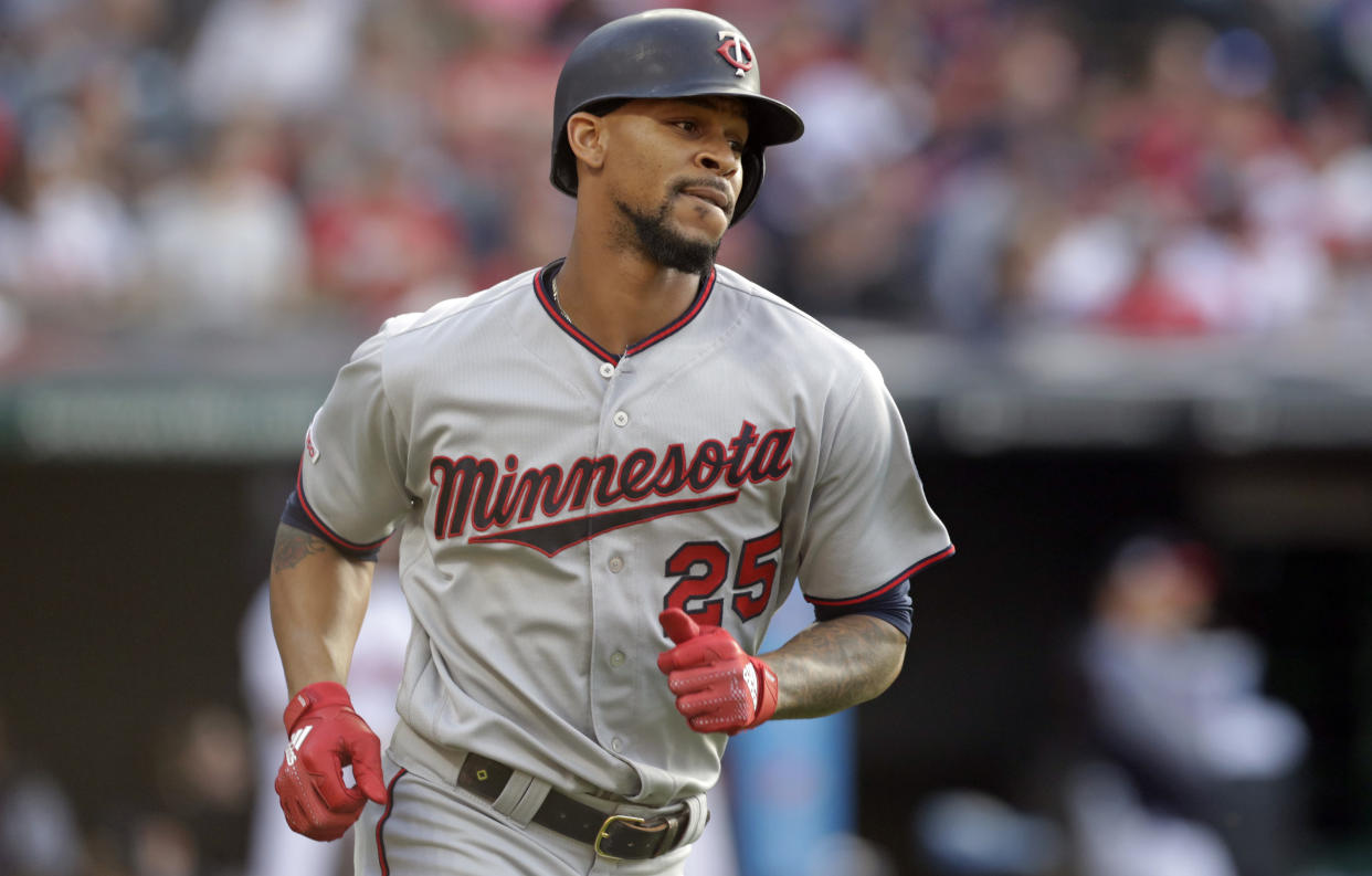 FILE - In this June 5, 2019, file photo, Minnesota Twins' Byron Buxton runs the bases after hitting a three-run home run in the second inning of the team's baseball game against the Cleveland Indians in Cleveland.  The Twins have placed center fielder Buxton and his ailing left shoulder on the 60-day injured list, ending his season and leaving the American League Central leaders without their best defensive player for the rest of the pennant race. The Twins made the move on Tuesday, Sept. 10, before a three-game series against Washington. (AP Photo/Tony Dejak, File)