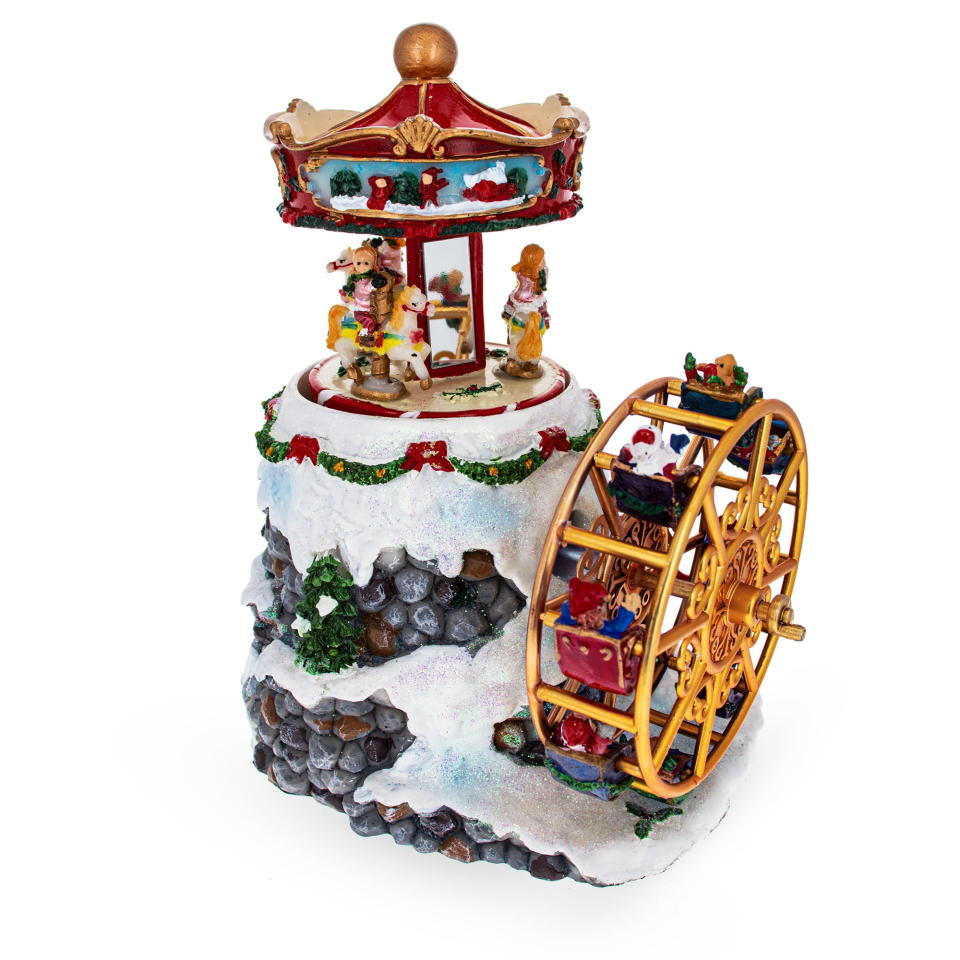 <p><a href="https://go.redirectingat.com?id=74968X1596630&url=https%3A%2F%2Fwww.walmart.com%2Fip%2FWhirling-Ferris-Wheel-Village-Musical-Christmas-Figurine-with-Rotating-Motion%2F126040122&sref=https%3A%2F%2Fwww.housebeautiful.com%2Fentertaining%2Fholidays-celebrations%2Fg45836744%2Fbeautiful-christmas-village-sets%2F" rel="nofollow noopener" target="_blank" data-ylk="slk:Shop Now;elm:context_link;itc:0;sec:content-canvas" class="link ">Shop Now</a></p><p>Whirling Ferris Wheel Village</p><p>walmart.com</p><p>$79.99</p>