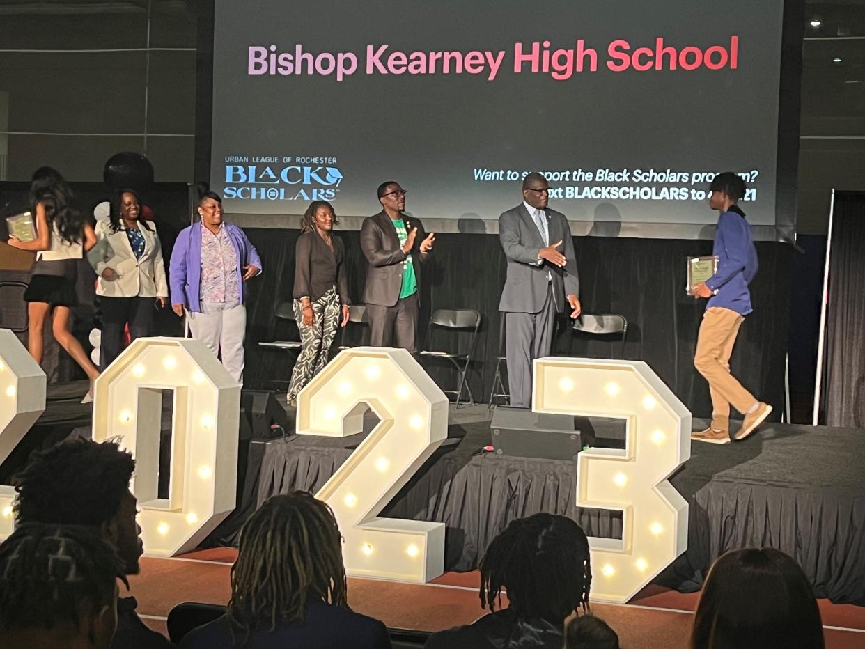 Black Scholars honored by the Urban League of Rochester lined up to walk the stage as part of a ceremony Monday evening, June 5, at Rochester Institute of Technology's Gordon Fieldhouse. Said keynote speaker Assembly member Demond Meeks: "I truly believe progress is waiting beyond the struggles."