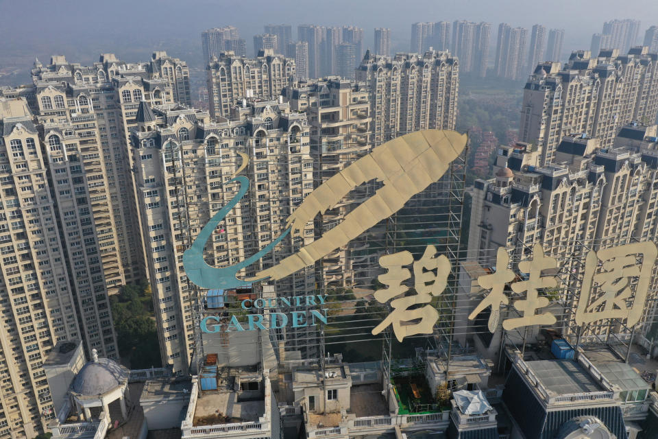 This aerial photo taken on October 31, 2021 shows a logo of Chinese property developer Country Garden on top of a building in Zhenjiang in China's eastern Jiangsu province.