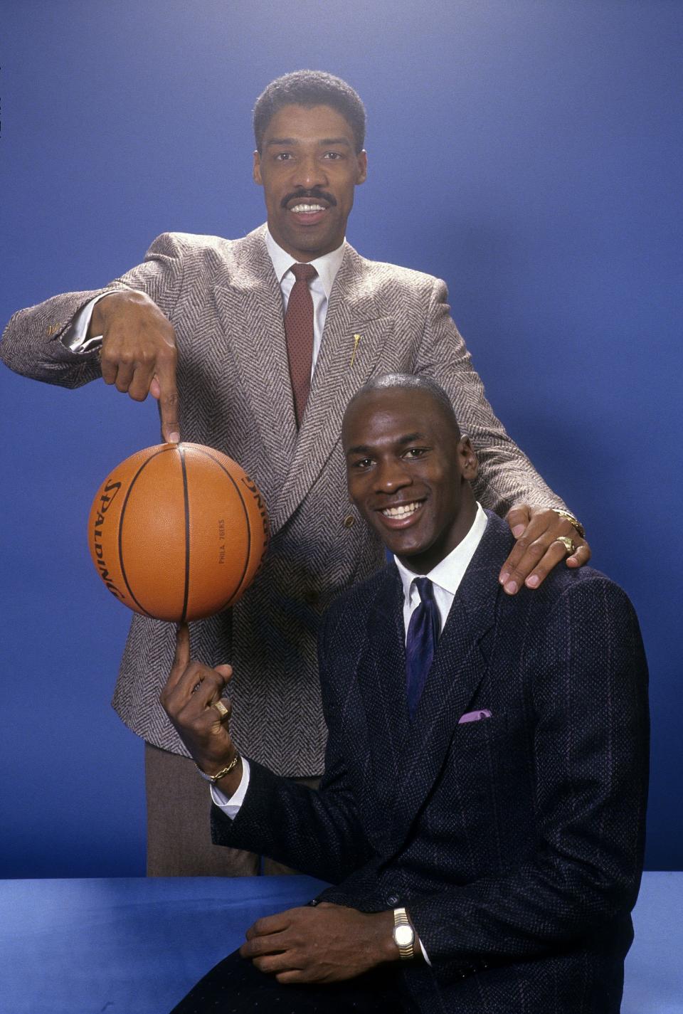 Michael Jordan poses with one of his boyhood idols, Julius Erving. (Getty Images)