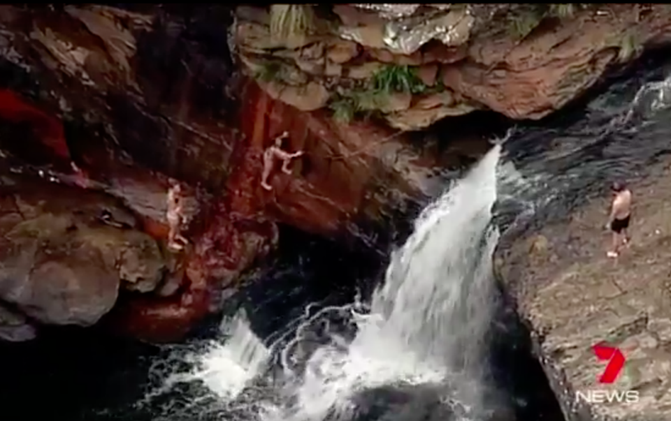 A man has fallen down a cliff near a waterhole south of Sydney. Source: 7 News