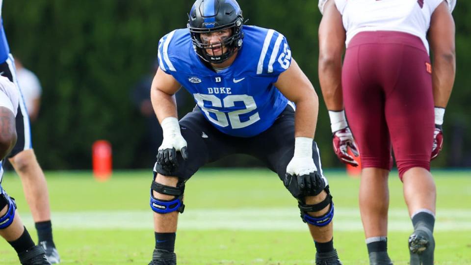 <div>DURHAM, NC - NOVEMBER 12: Graham Barton (62) of the Duke Blue Devils gets set on the line during a football game between the Duke Blue Devils and the Virginia Tech Hokies on Nov 12, 2022 at Wallace Wade Stadium in Durham, NC. (Photo by David Jensen/Icon Sportswire via Getty Images)</div>