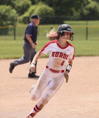New Boston Huron's Emma Sic rounds third base during the Regional finals last season against Chelsea.