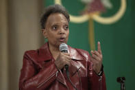 FIlE - Chicago Mayor Lori Lightfoot participates in a forum with other Chicago mayoral candidates hosted by the Chicago Women Take Action Alliance Jan. 14, 2023, at the Chicago Temple in Chicago. (AP Photo/Erin Hooley, File)