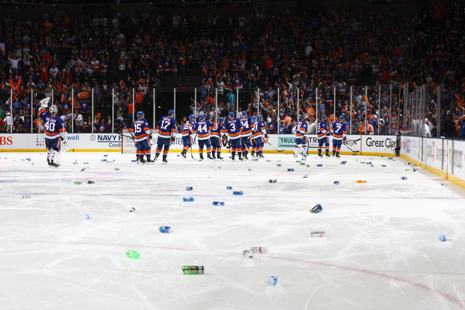 UNIONDALE, NEW YORK - JUNE 23:  The New York Islanders celebrate after a game winning goal in overtime by Anthony Beauvillier #18 to force a Game 7 against the Tampa Bay Lightning in Game Six of the Stanley Cup Semifinals of the 2021 Stanley Cup Playoffs at Nassau Coliseum on June 23, 2021 in Uniondale, New York. (Photo by Mike Stobe/NHLI via Getty Images)