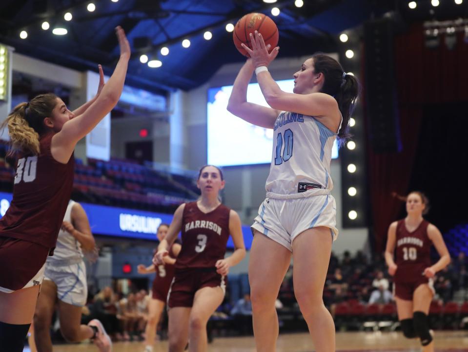 Ursuline's Sophie Nascimento (10) puts up a shot against Harrison during the Section1 Class AA girls basketball semifinal at the Westchester County Center in White Plains Feb. 27, 2024.