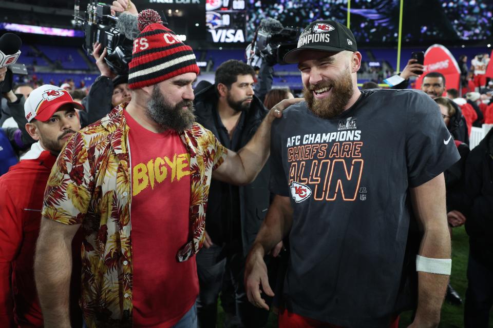 Travis Kelce #87 of the Kansas City Chiefs celebrates with his brother Jason Kelce after a 17-10 victory against the Baltimore Ravens in the AFC Championship Game at M&T Bank Stadium on Jan. 28, 2024, in Baltimore, Maryland.