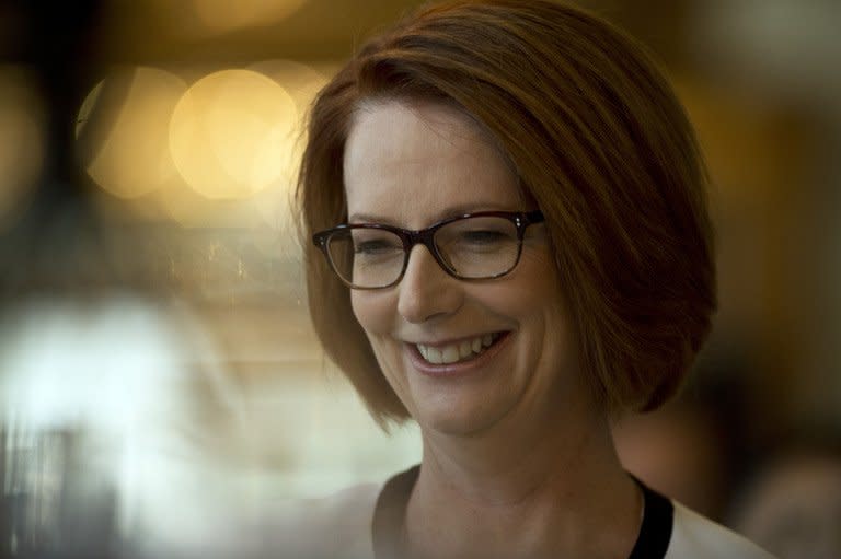 Australia's Prime Minister Julia Gillard smiles prior to giving an address to the Foreign Corresspondents Association in Sydney on April 4, 2013. Gillard, who is tipped to lose her bid for a third Labor government term in September, said unusually low tax revenue, which wasn't forecast even a few months ago would require serious belt-tightening in the next budget