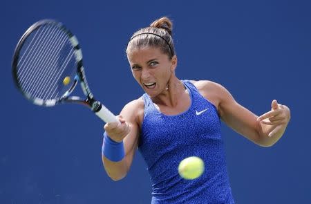 Sara Errani of Italy hits a return to Mirjana Lucic-Baroni of Croatia during their match at the 2014 U.S. Open tennis tournament in New York, August 31, 2014. REUTERS/Ray Stubblebine