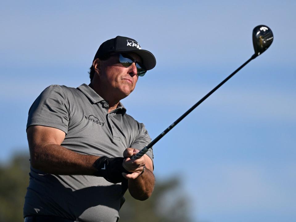 Phil Mickelson plays a shot at the the Farmers Insurance Open.